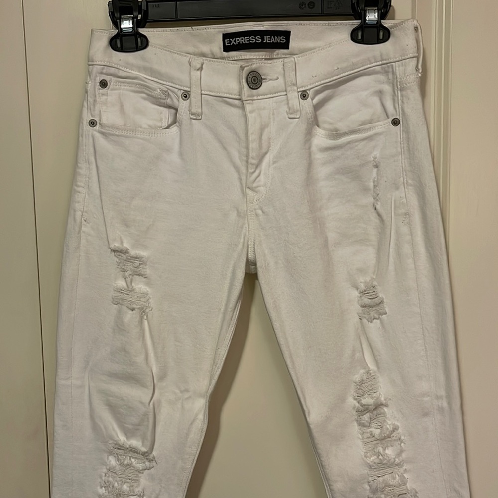 White Express jeans, size 4R. Legging mid rise. Open to any offer!